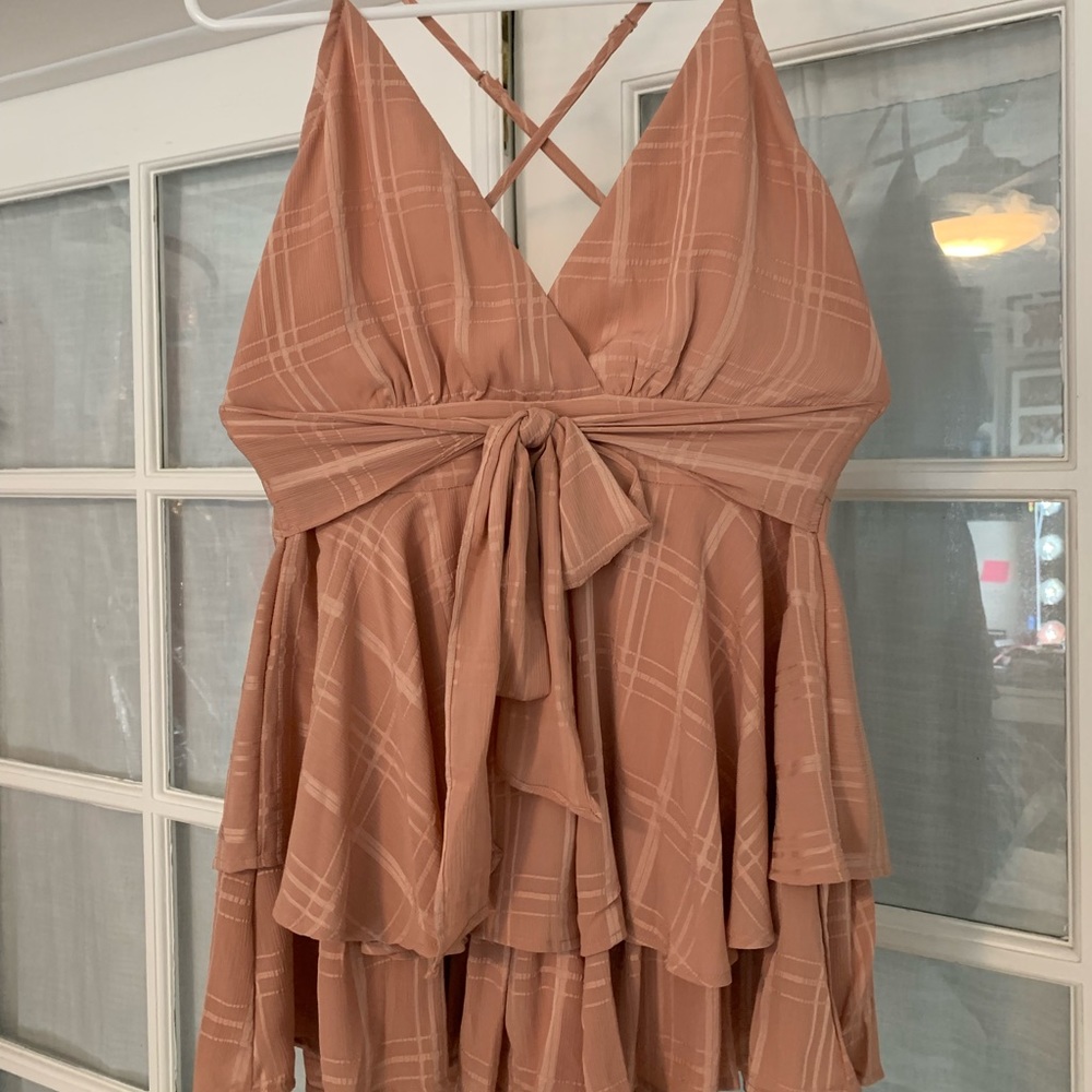 Brand new, never worn, ruffled romper dress!